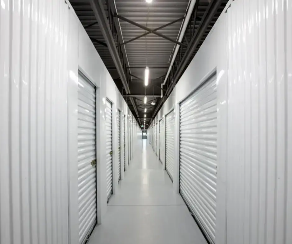 Self storage unit hallway, white doors and hallway